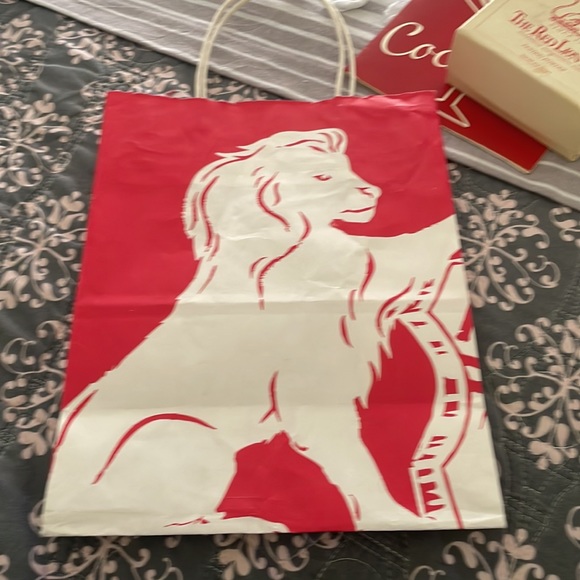 Dusting powder, cocktail menu, and paper bag.   Very cool… - Picture 8 of 8